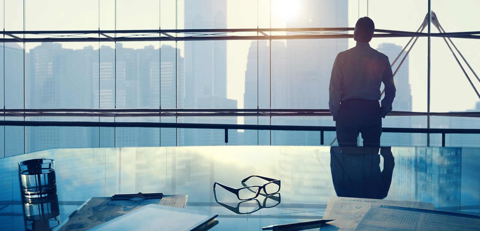 Businessman in a big office